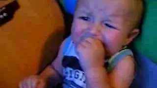 Baby eats warhead FUNNY