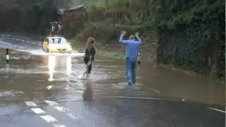Looe, Cornwall floods traffic control:  Always give clear signals!
