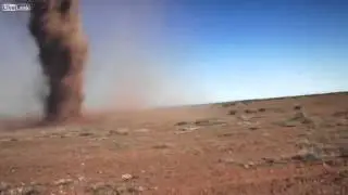 LiveLeak - Guy runs into tornado Real or Fake ?