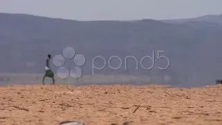 Nomadic Man Walking Through Desert . Stock Footage