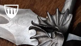 Forging the House of Dragon sword, part 3, sculpting the dragon wing chappe.