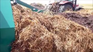 Nufab Compost Turner working a compost wind row