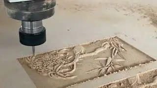 The CNC router cutting machine uses the spindle to carve and process wooden boards with patterns#cnc