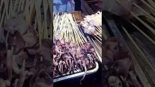 SQUID on a stick in China !!!! #china #squid #food #streetfood #asia #foodporn #shorts