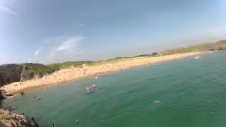 jumping off the rocks at broad haven beach 2
