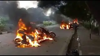 Vehicles torched by Dera followers in Panchkula.