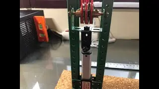 ELEVADOR CON TRÓCOLA Y ACTUADOR LINEAL