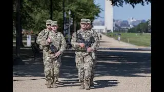 Tourists in Washington react to National Guard units carrying firearms