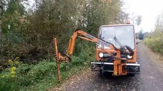 Multicar  26 стрижка кустов