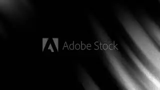 Curved lines in gray and white on a black background. Abstract design suitable for backgrounds