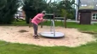 Stupid dane playing on the merry-go-around.3gp