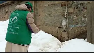 Census Team performing their duties in spite of hard weather in snowfall areas.