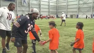 Chicago Bears Josh Blackwell and Braxton Jones pitch in at Rockford Football Youth Training Camp