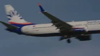 Zurich Airport SunExpress airplane Boeing 737 MAX 8 TC-SMB landing on a sunny autumn day.