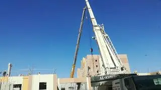 Crane operation installing Hollocore.