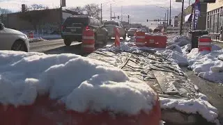 Brighton Park residents protest concrete bike lane barriers, raising safety concerns