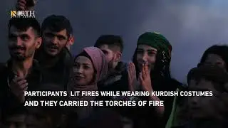 Residents of the city of Syria’s Amuda celebrate Newroz