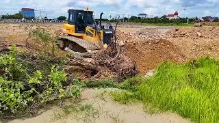 The Perfectly Building Road Construction Over The Water Using Dozer Pushing Stones For Huge