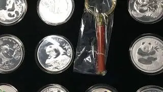 What's wrong with this China silver panda coin set? - Counterfeit coin detection tips