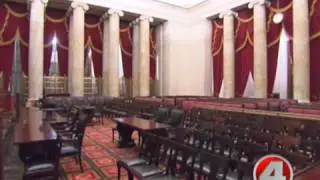 Supreme Court justices questioning briskly in health care case