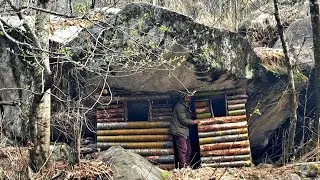 Alone  build bushcraft shelter with fireplace under a stone | survival shelter by river side