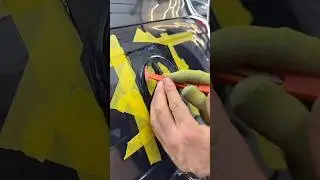 How to wrap a Mercedes emblem without removing it?