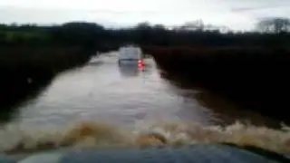 flood driving in landrover defender