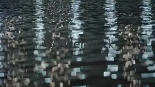 A closeup of a shimmering water surface