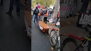 Man with coffin for the disabled and poor!
