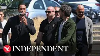 Tate brothers arrive at court after being charged with rape and human trafficking