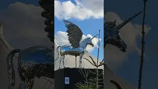 Great Glitter Flying Unicorn At Tollwood Festival In Munich
