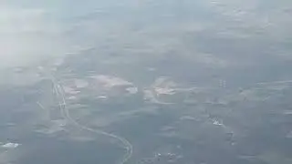Stunning Aerial View: Buffalo to New York Plane Journey Above the Clouds