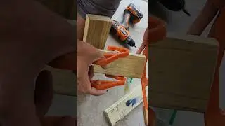 Fixing a flimsy basketball return to actually send the ball forward. Used a 2x4 and plywood.