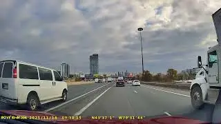 Van cuts off cars and two solid lines to exit