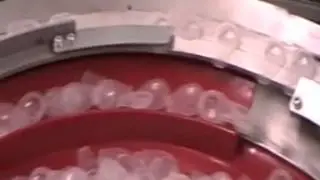 Unite Automation - Vibration Parts Feeder handling plastic blister