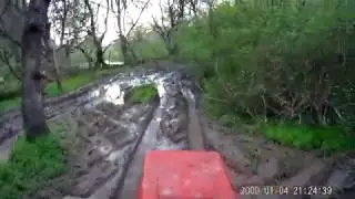 mud mower got stuck twice down in the swamp fun times i had and got muddy doing it