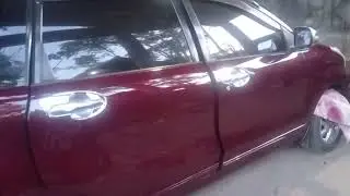 cat ulang Avanza 2012 merah metalik.