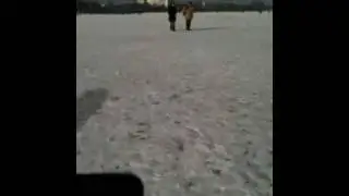 Crossing frozen Alster with bike