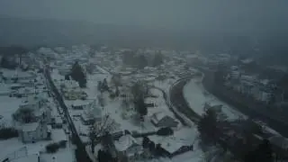 AMAZING FLYING AROUND TOWN!!!!! SNOWY MIDLAND,MD........DJI MAIVIC