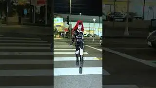 Drag queen crosses street in DANGEROUS platforms