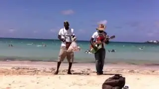 Cigarette on the beach Negril Jamaica..Donovan and Andre
