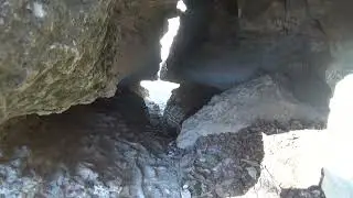 A drop down cave in Bull Creek Park.
