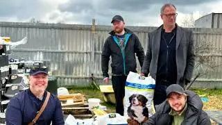 Delivering dog food to a kennel on the front lines of the war