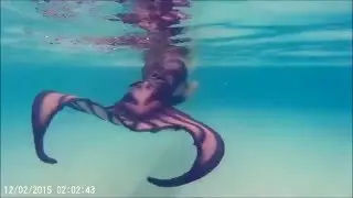 Playful mermaid April
