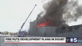 Firefighters battle large warehouse fire in Kansas City, Kansas
