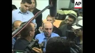 Israeli Defence minister Shaul Mofaz visits Jewish settlement, protest