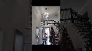 Installation chandelier high ceiling