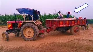 Eicher 242 tractor is transporting gravel and cement in half trolley | Eicher tractor