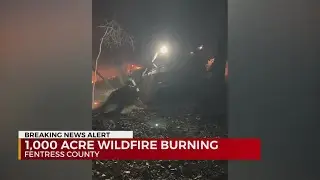 Crews battle 1,000 acre wildfire burning in Fentress County