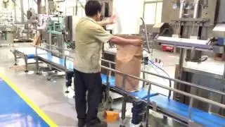 25kg Milk Powder Filling & Vacuum Sealing & Sewing Line